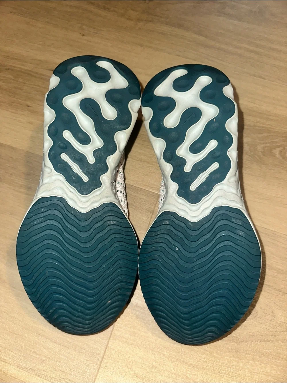 Nike Women’s White Knit Slip-On Sneakers with Teal and Gray Accents